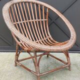 Vintage rattan shell basket armchair