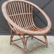 Vintage rattan shell basket armchair