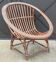 Vintage rattan shell basket armchair