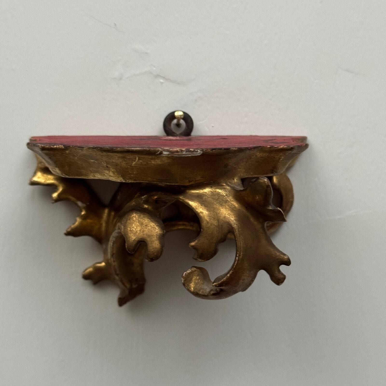 Set of three gilded wood consoles in Rococo style, late 19th century.