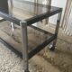 Metal coffee table with smoked glass.