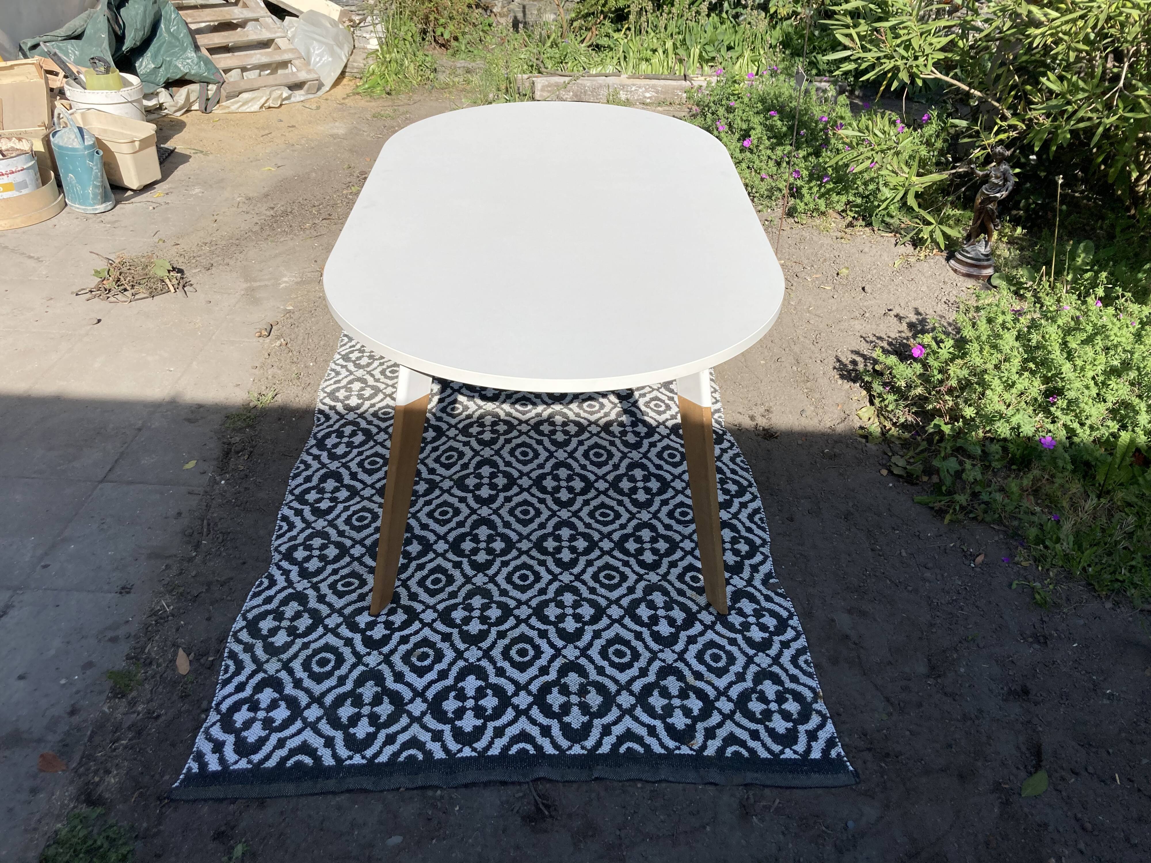 White oval table solid wood base