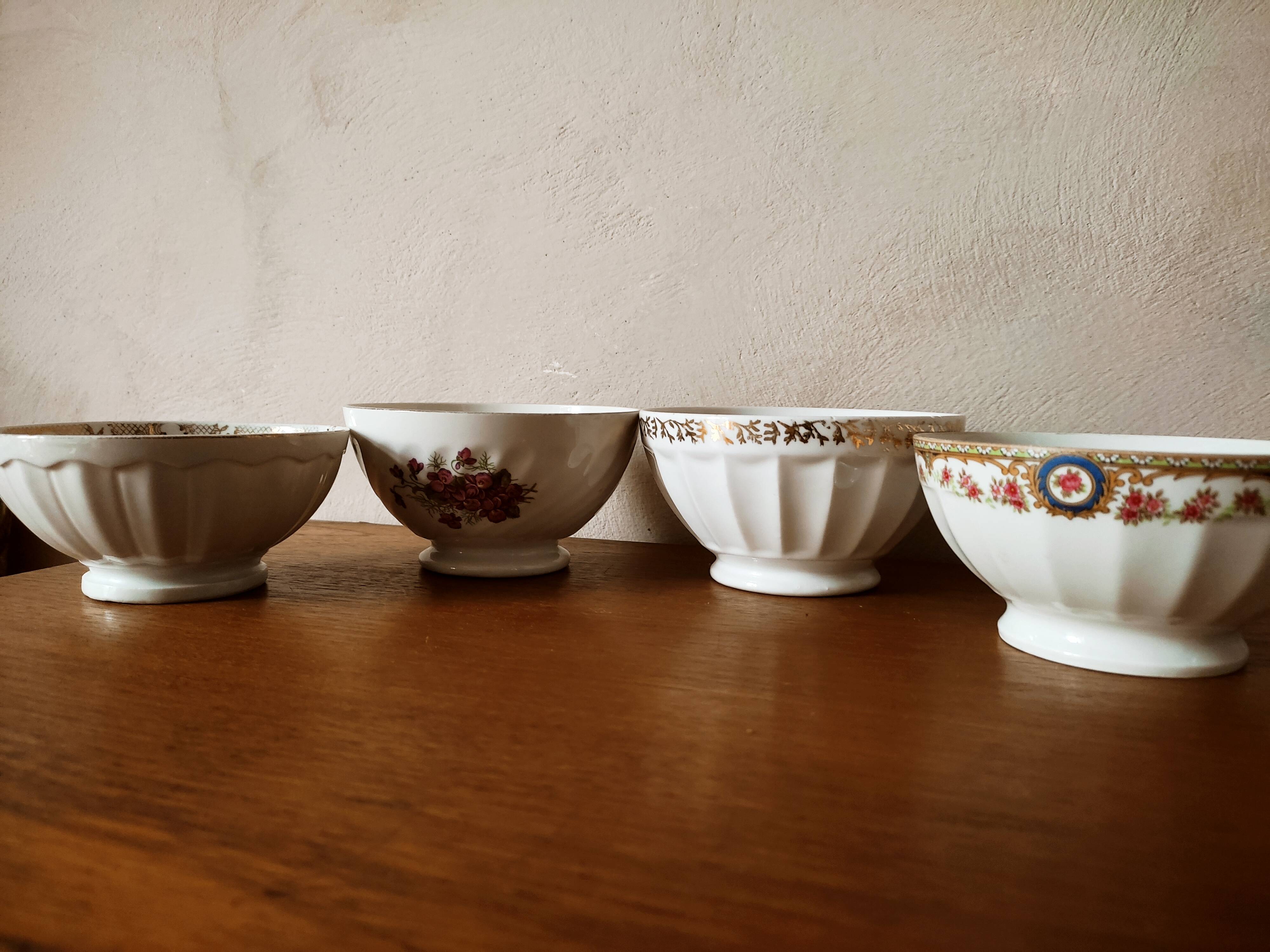 Set of 12 mismatched porcelain bowls