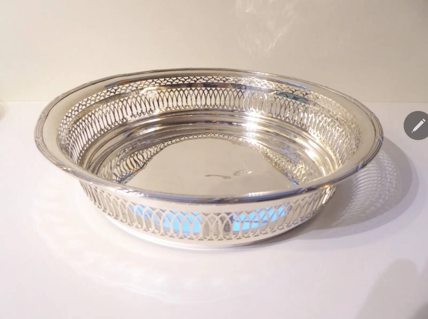 Large openwork basket in silver metal