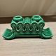 Pair of Art Deco green ceramic candlesticks