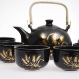 Japanese tea service, teapot and 6 cups, black, gold pattern.