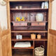 Glass-fronted cabinet in solid wood