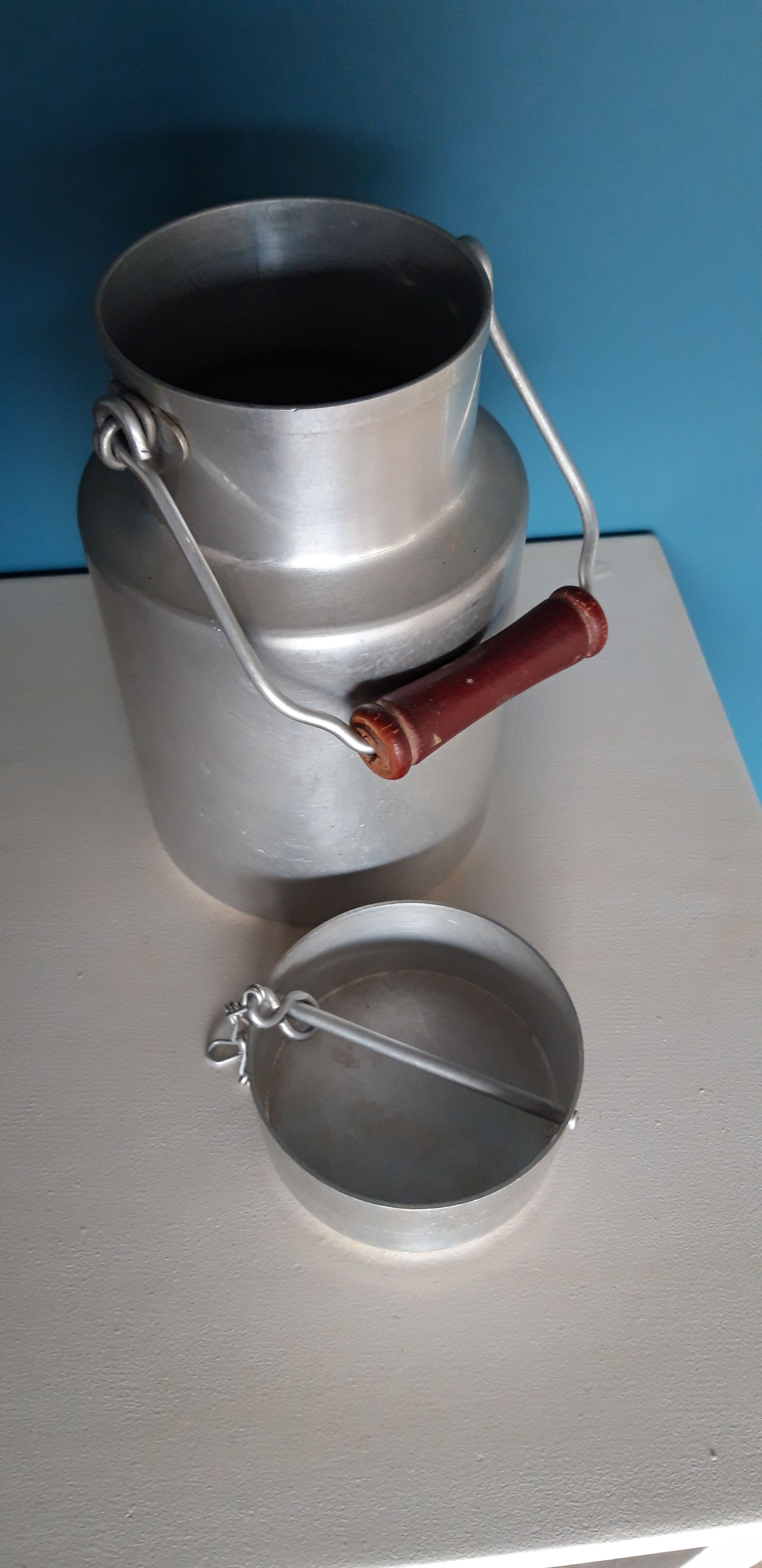 Antique milk jug in pure aluminum