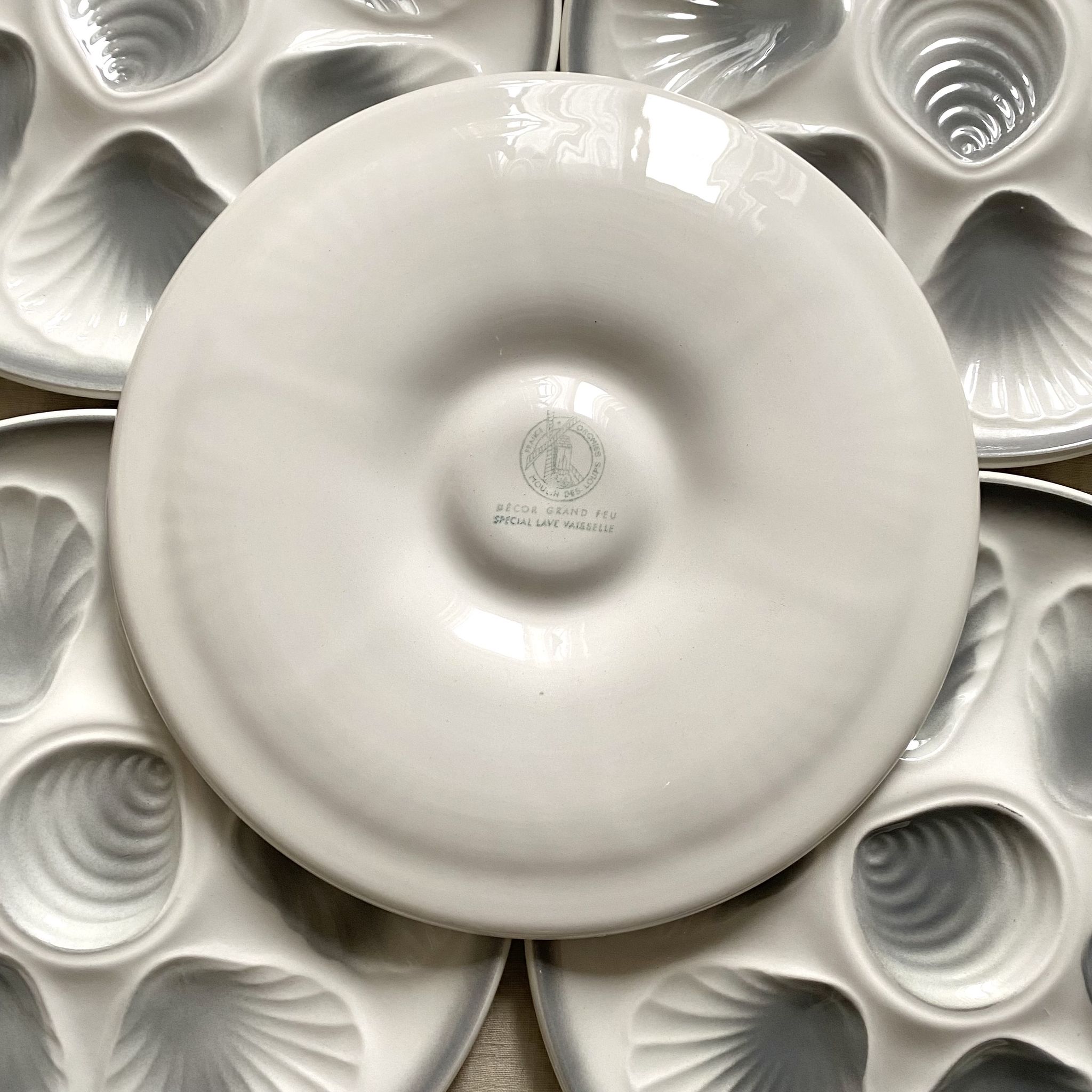 14 assiettes à huîtres Moulin des loups