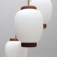 Bent Karlby "China" pendant lights, 3 lights, teak and glass, Lyfa, Denmark, 1960.