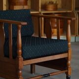 Art Nouveau, pair of oak lounge chairs, reupholstered in style fabric, 1920s.