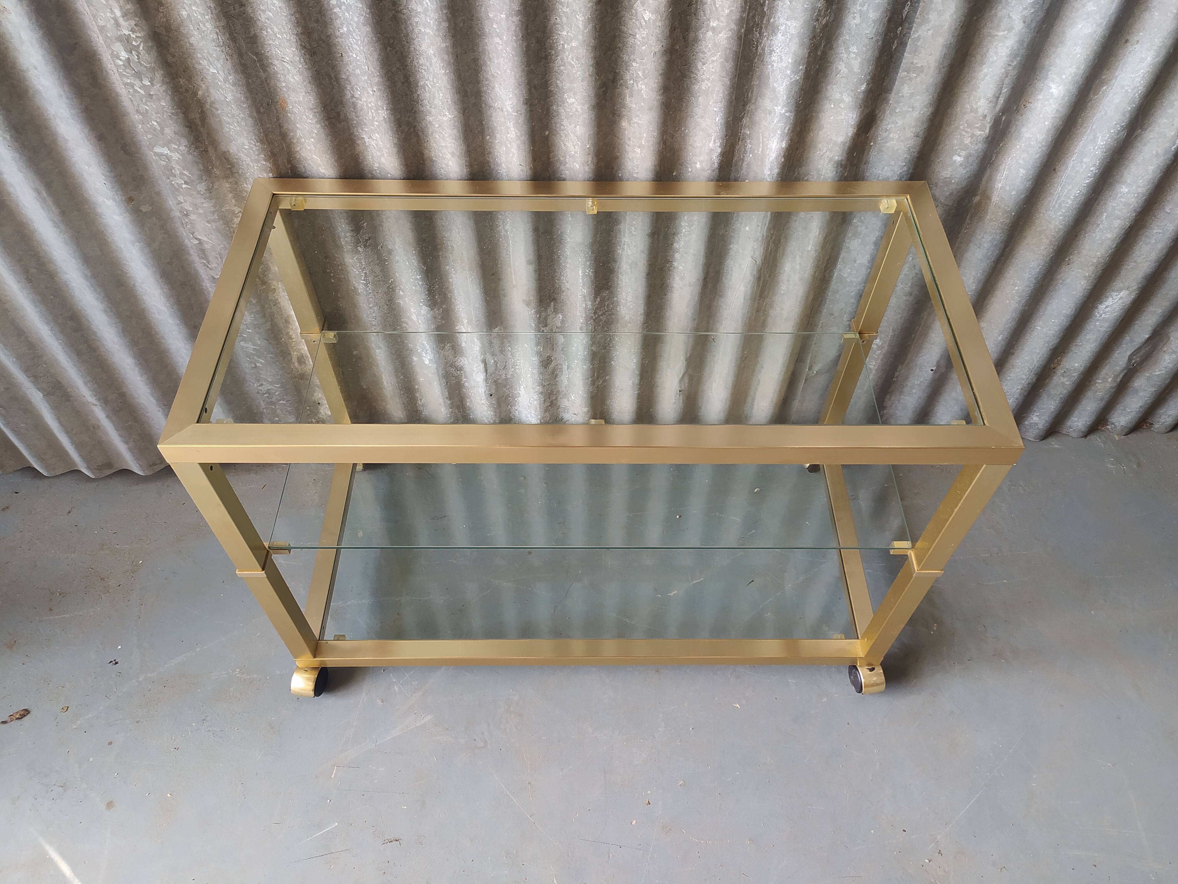 Table basse vintage metal doré et verre