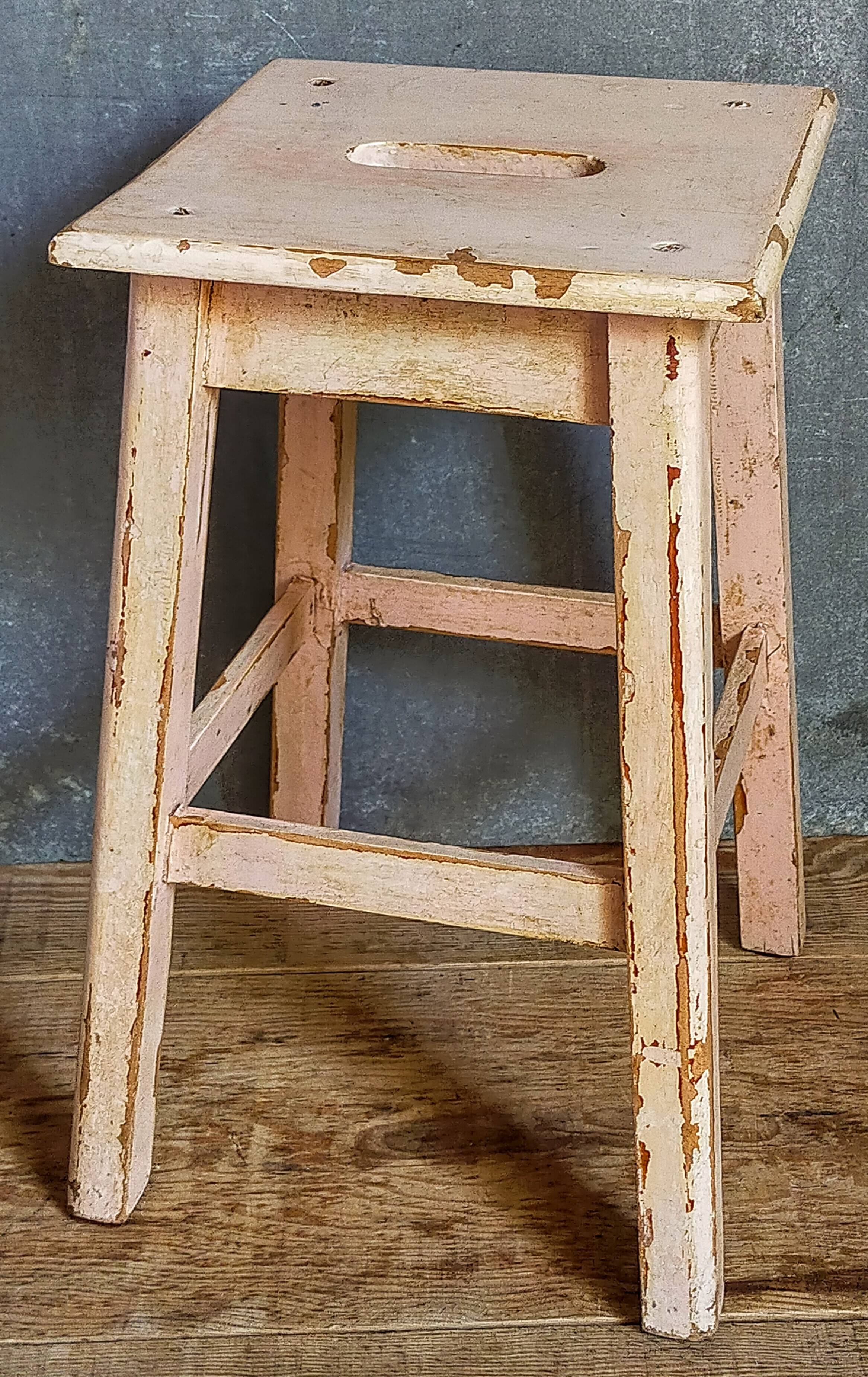 Antique workshop stool in patinated solid wood