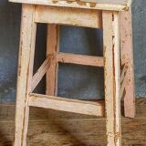 Antique workshop stool in patinated solid wood