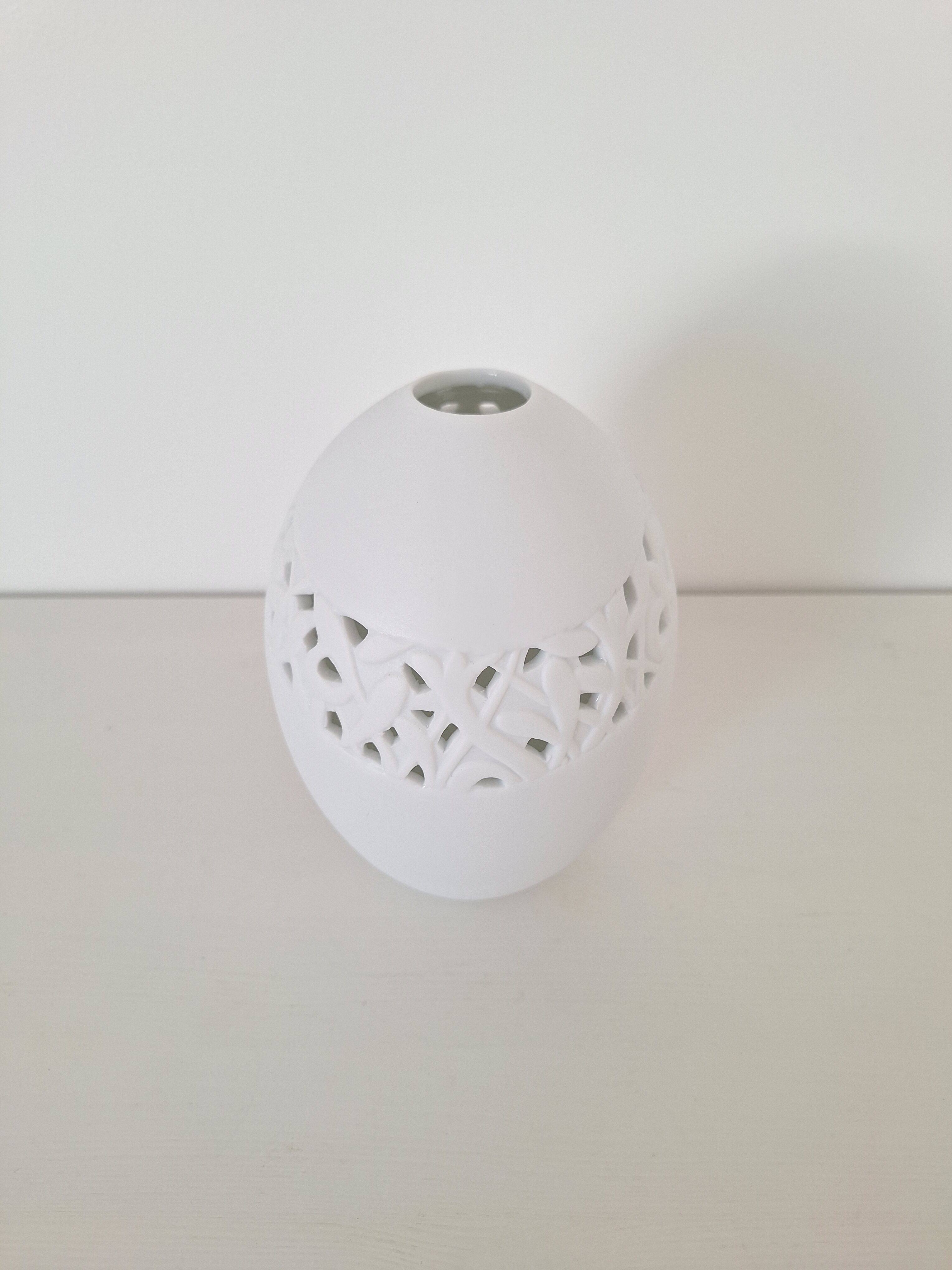 White porcelain egg vase