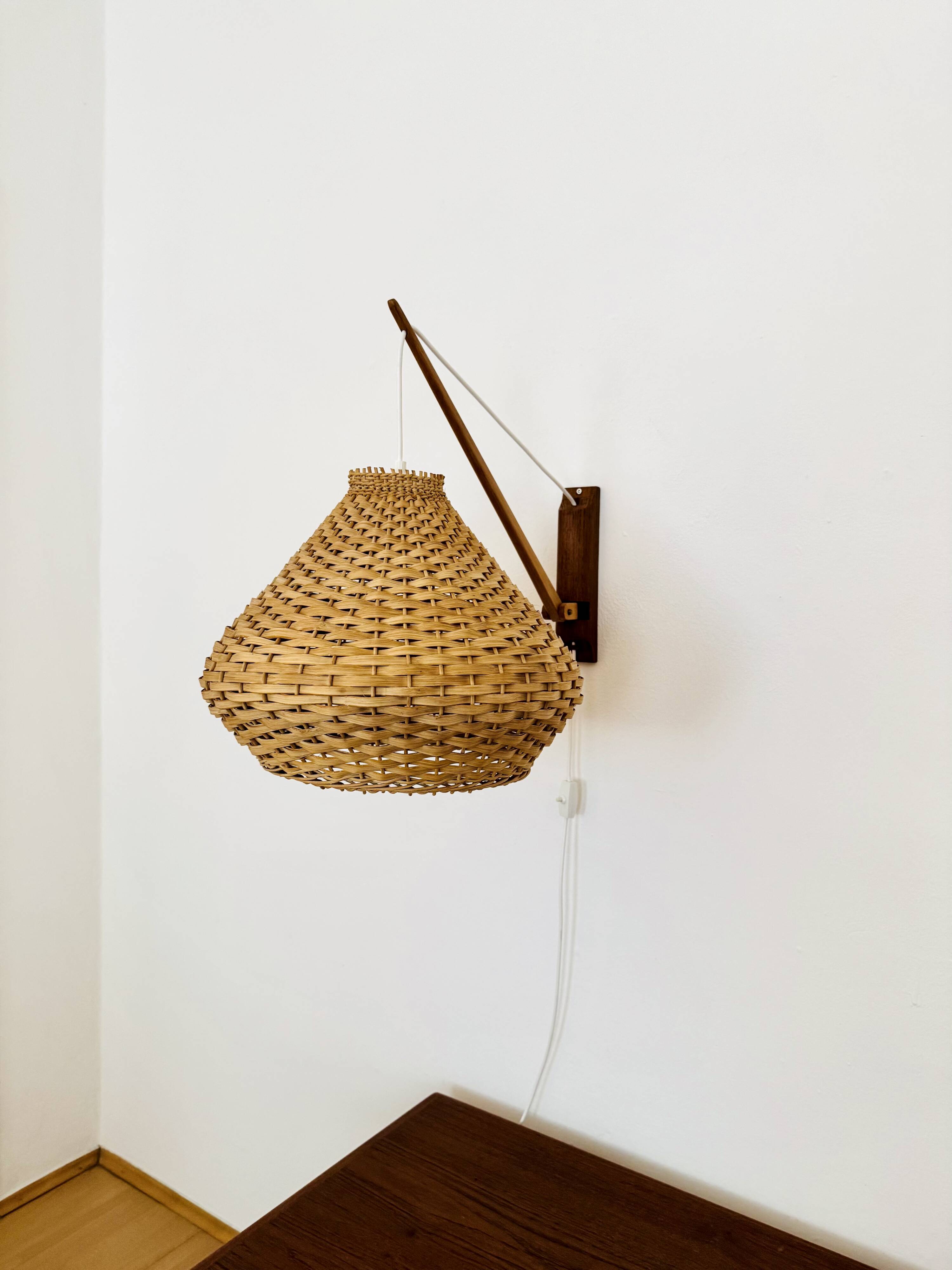 Adjustable Wicker Wall Lamp