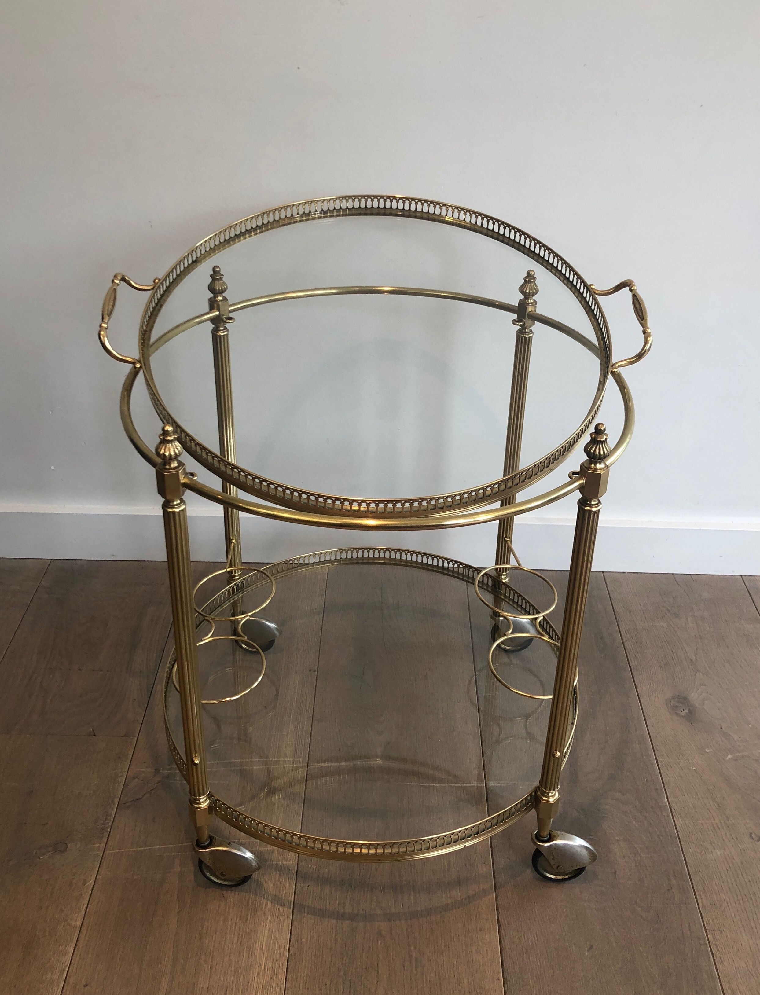 Neoclassical style rolling table in brass