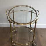 Neoclassical style rolling table in brass