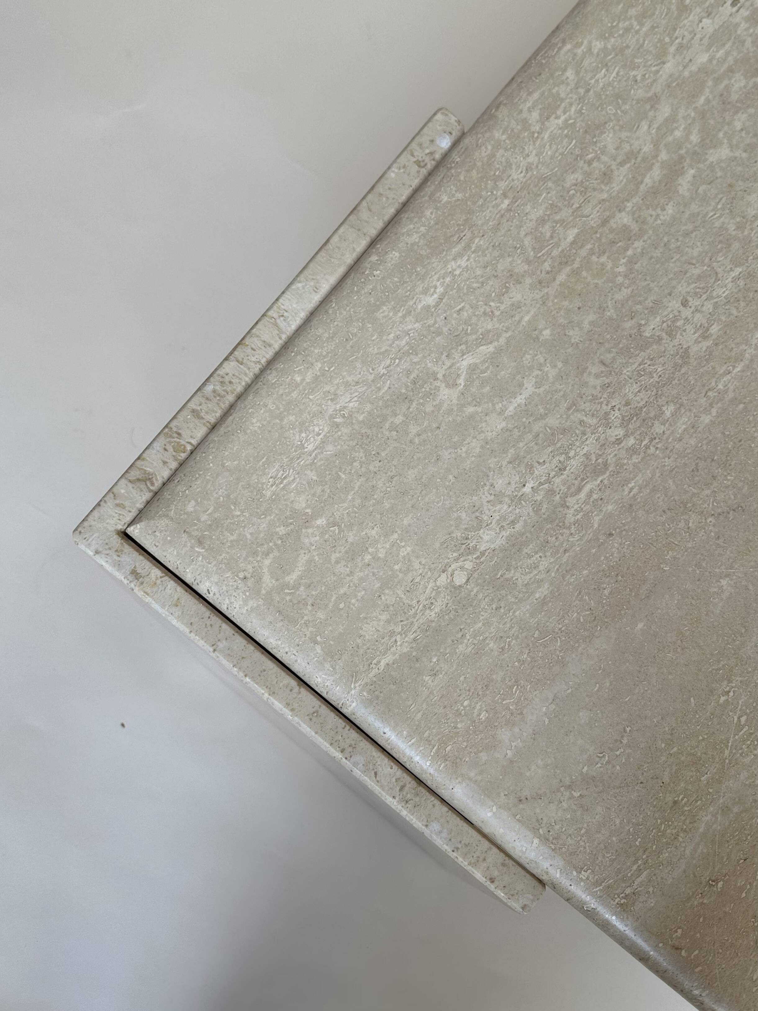 Travertine eye-shaped coffee table