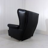 Black leather wingback chair on wheels 1960’s