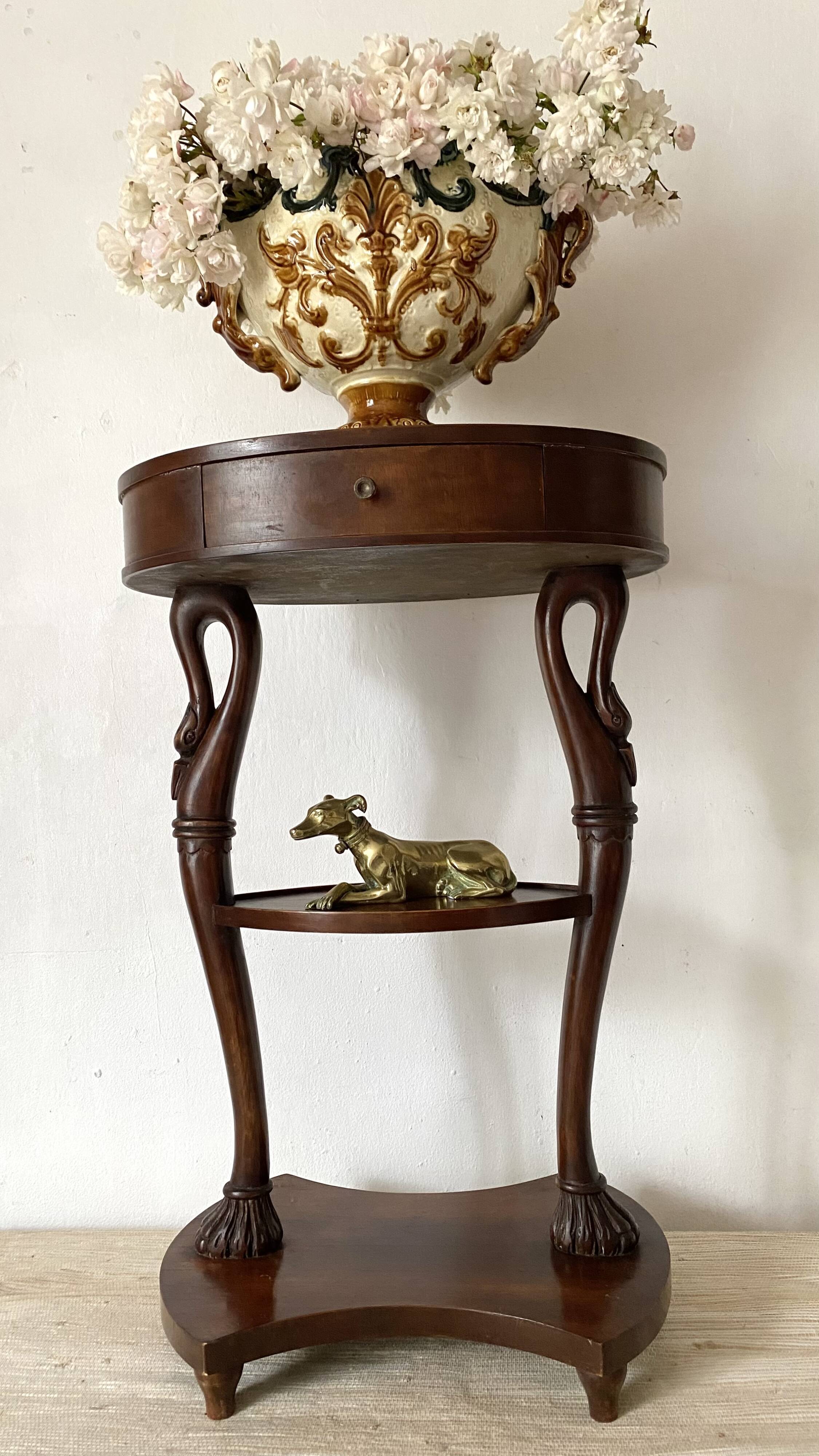 Empire style swan neck and lion paw pedestal table