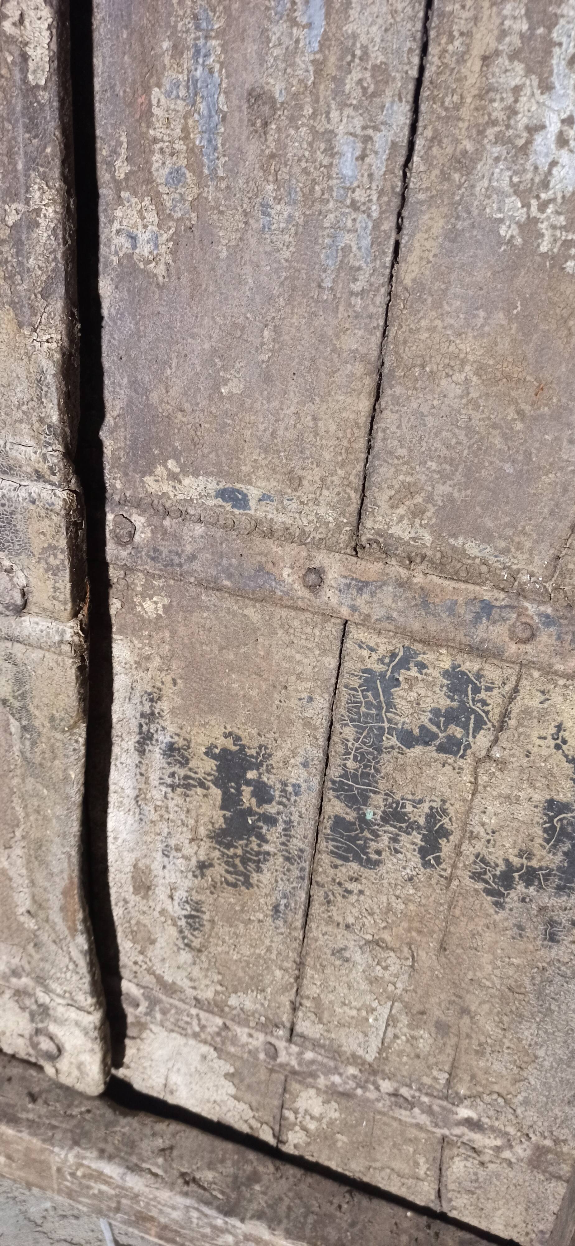 Old wooden door with frame