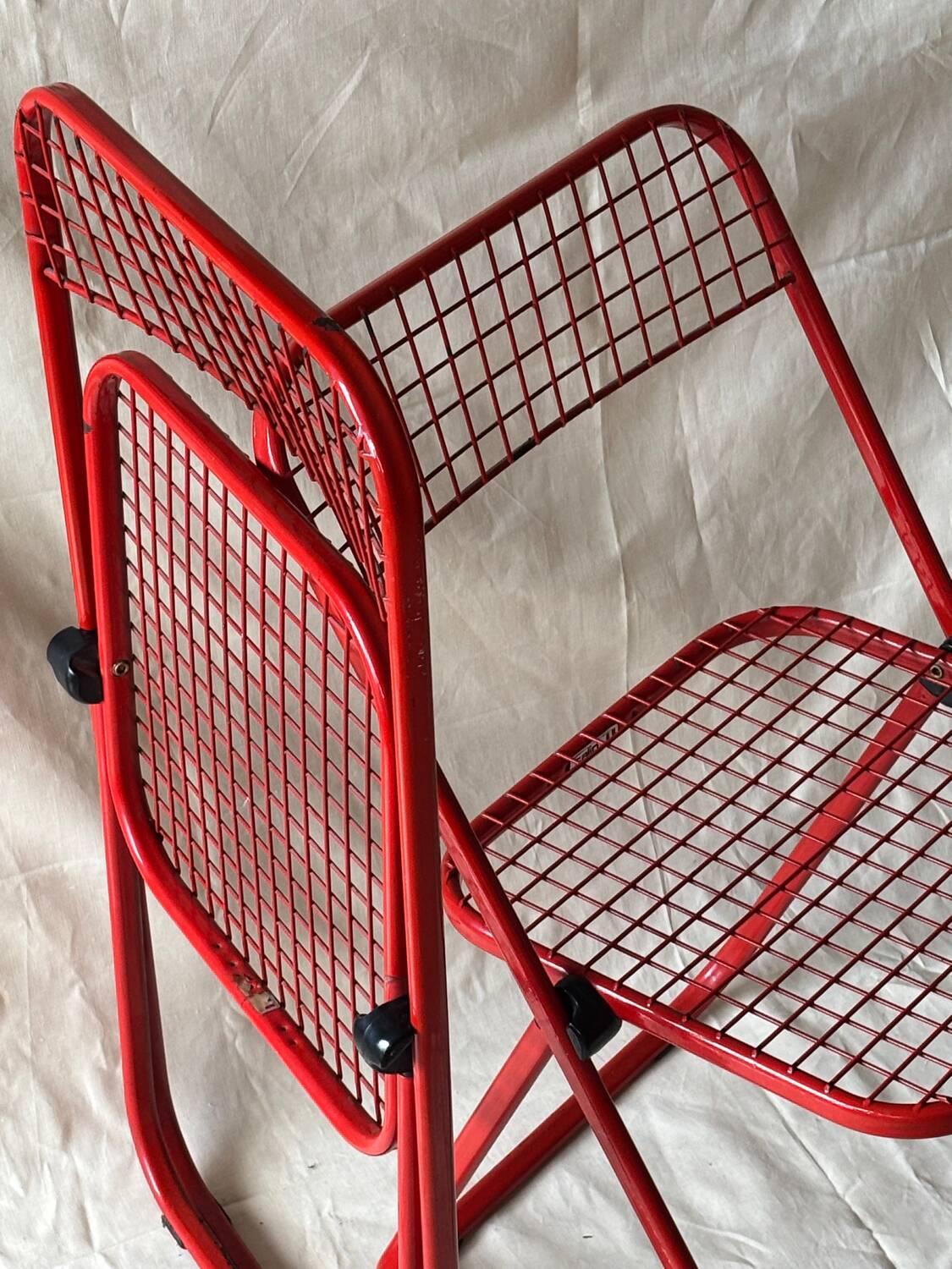 Red folding chairs Talin Italy, 1980
