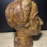 Brutalist head in varnished plaster