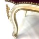 Louis XV armchair in gilded wood and garnet red velvet