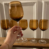 6 amber stemmed glasses