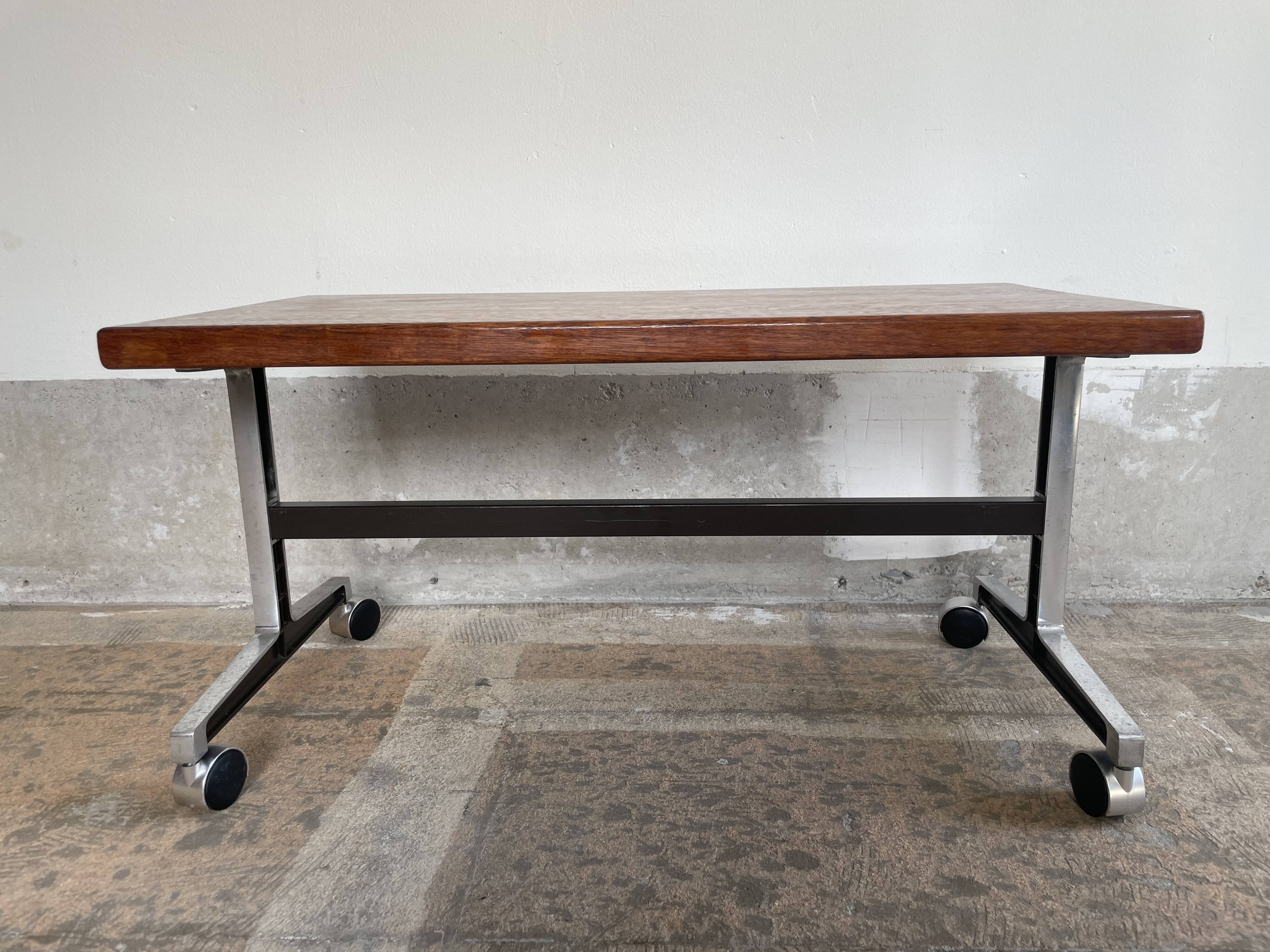 Wooden side table with chrome frame on wheels