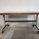 Wooden side table with chrome frame on wheels