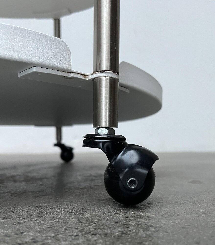 Minimalist Thrill metal coffee table or side table with wheels by Leitmotiv.