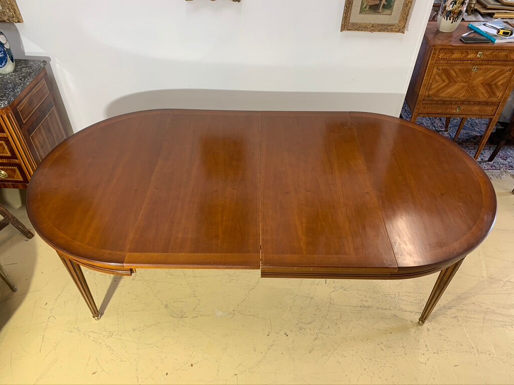Louis XVl style round table in cherry with extensions