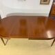 Louis XVl style round table in cherry with extensions