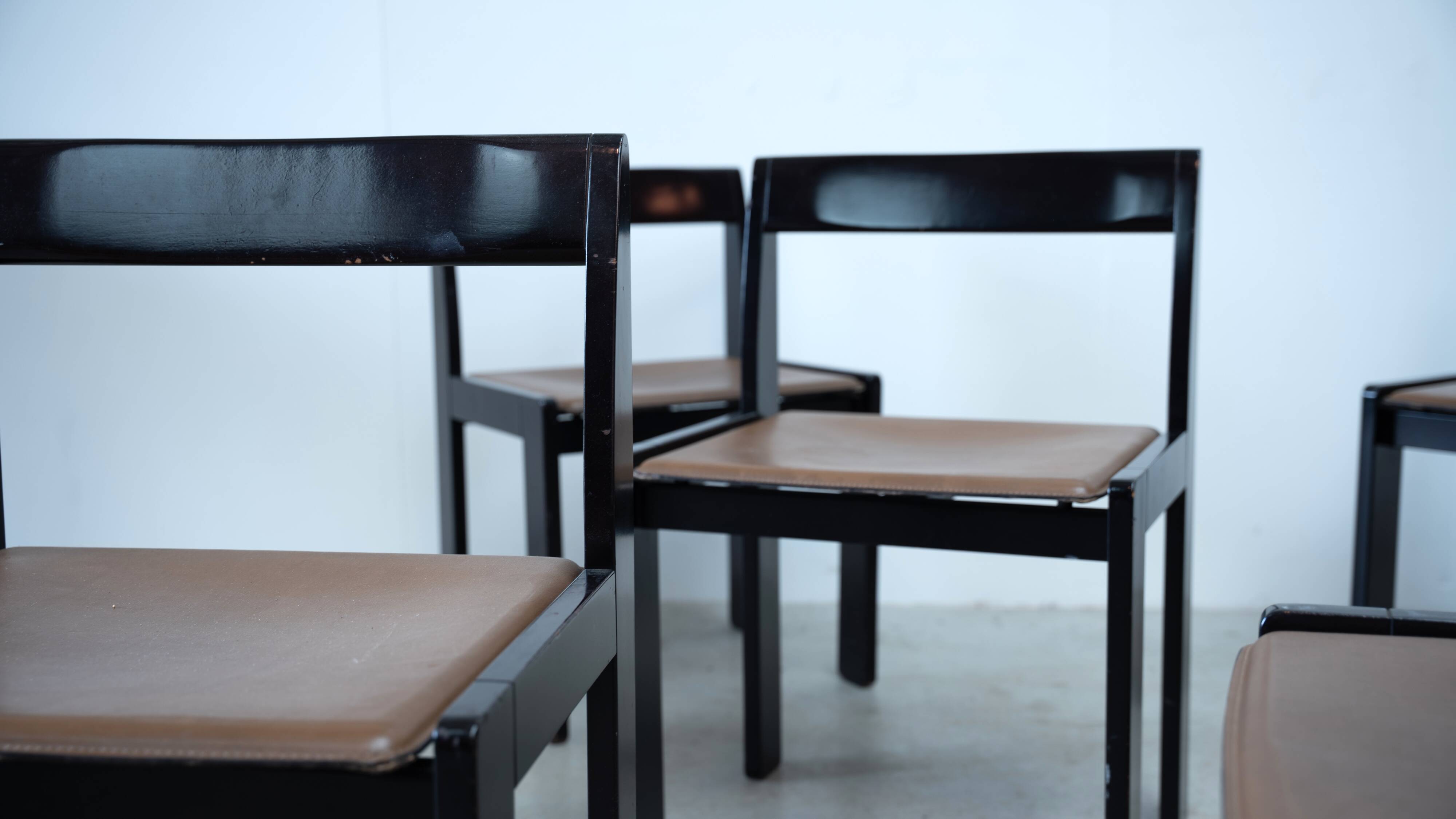 Set of eight black lacquered dining chairs
