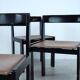 Set of eight black lacquered dining chairs