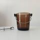 Vintage 1970s ice bucket and tongs.