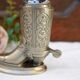 Decorative table lighter in the shape of a cowboy boot.