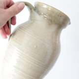 Old decanter in enamelled sandstone