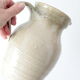 Old decanter in enamelled sandstone