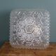 Square globe ceiling light in moulded glass.