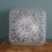 Square globe ceiling light in moulded glass.