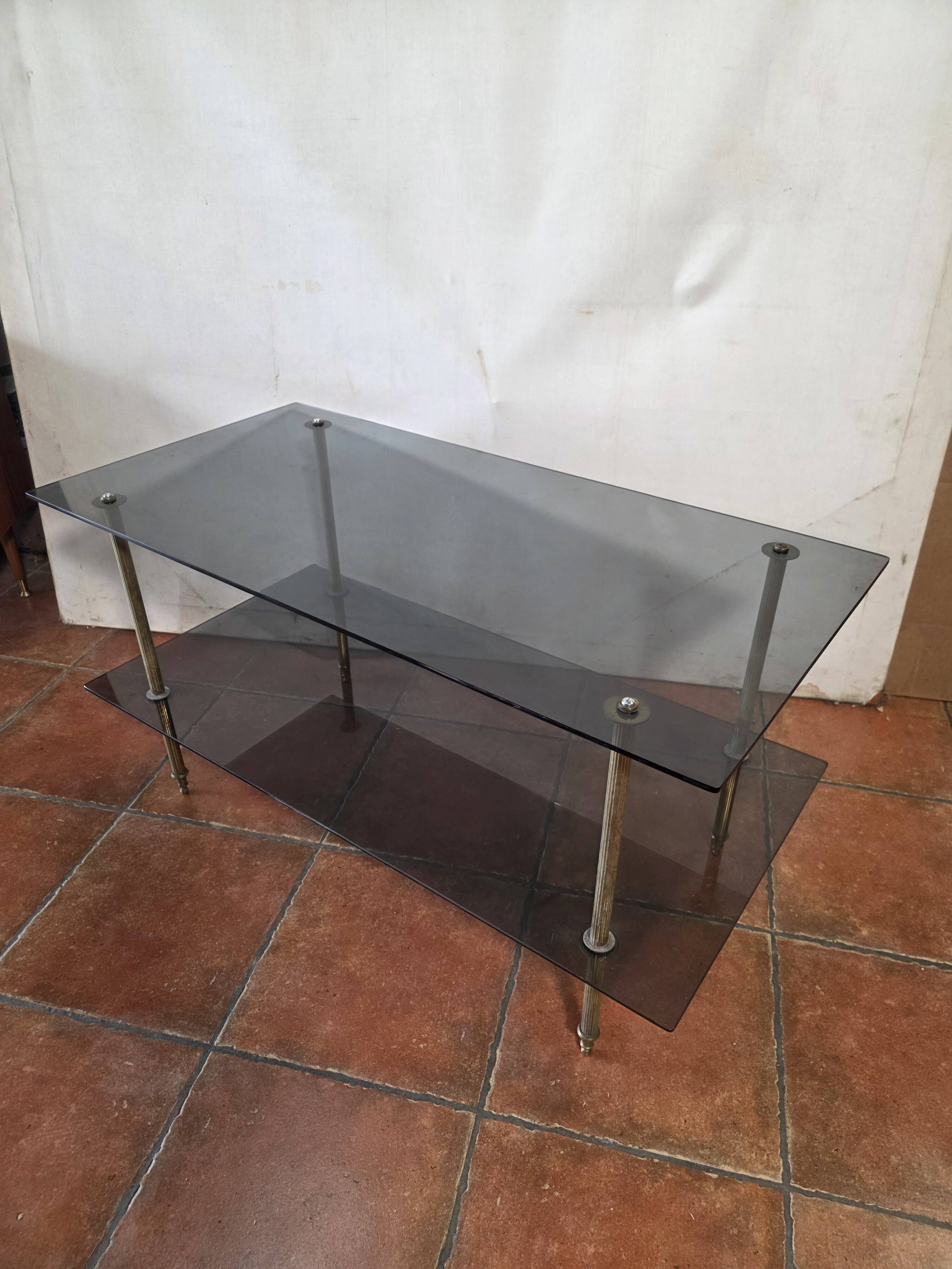 Smoked glass and brass coffee table from the 1970s.