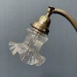 French art nouveau table lamp with transparent glass shade