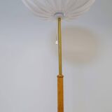Mid-century floor lamp in brass and oak by Falkenbergs Belysning, Sweden, 1960s.