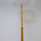 Mid-century floor lamp in brass and oak by Falkenbergs Belysning, Sweden, 1960s.