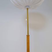 Mid-century floor lamp in brass and oak by Falkenbergs Belysning, Sweden, 1960s.