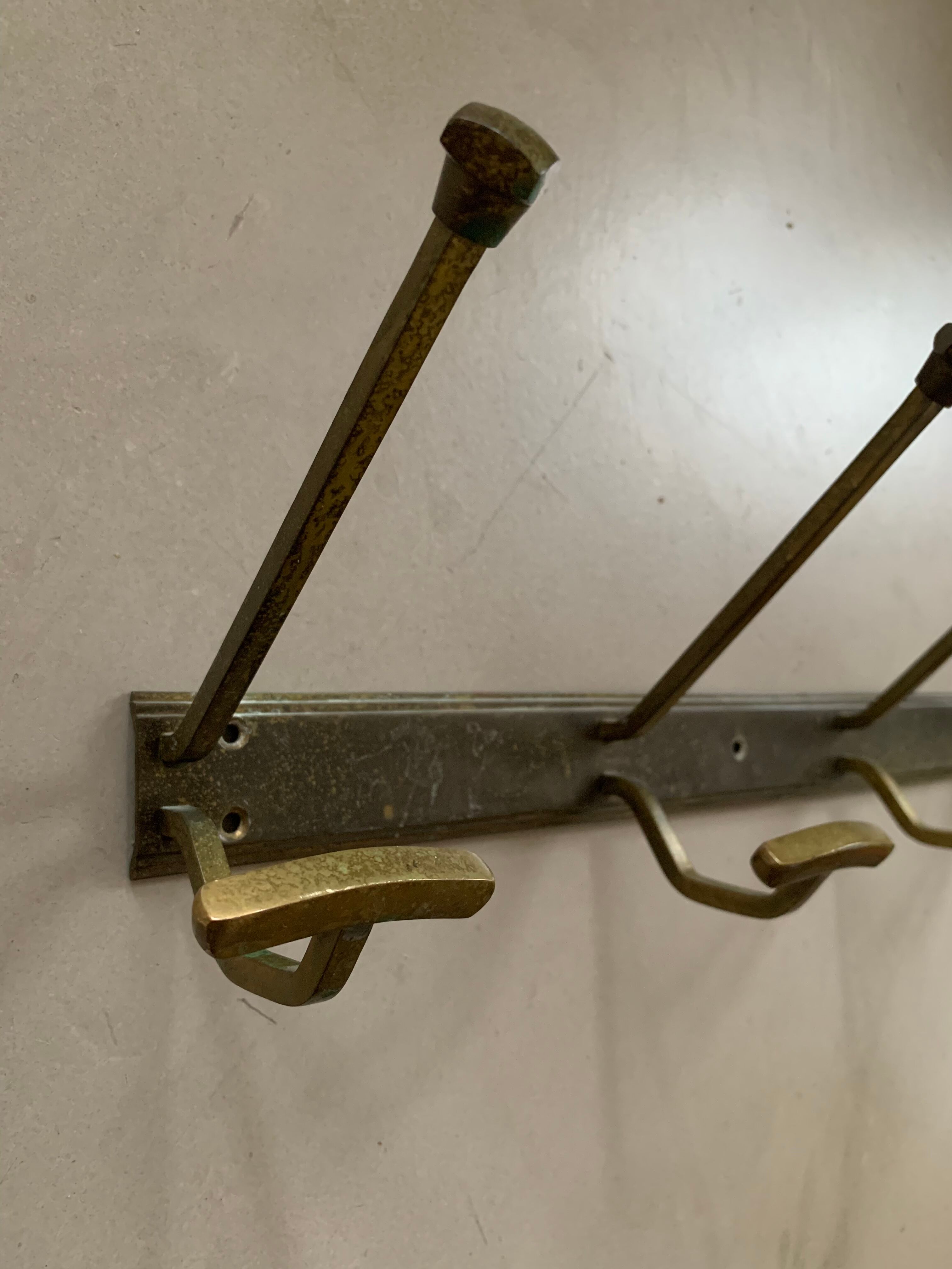 Antique brass wall coat rack