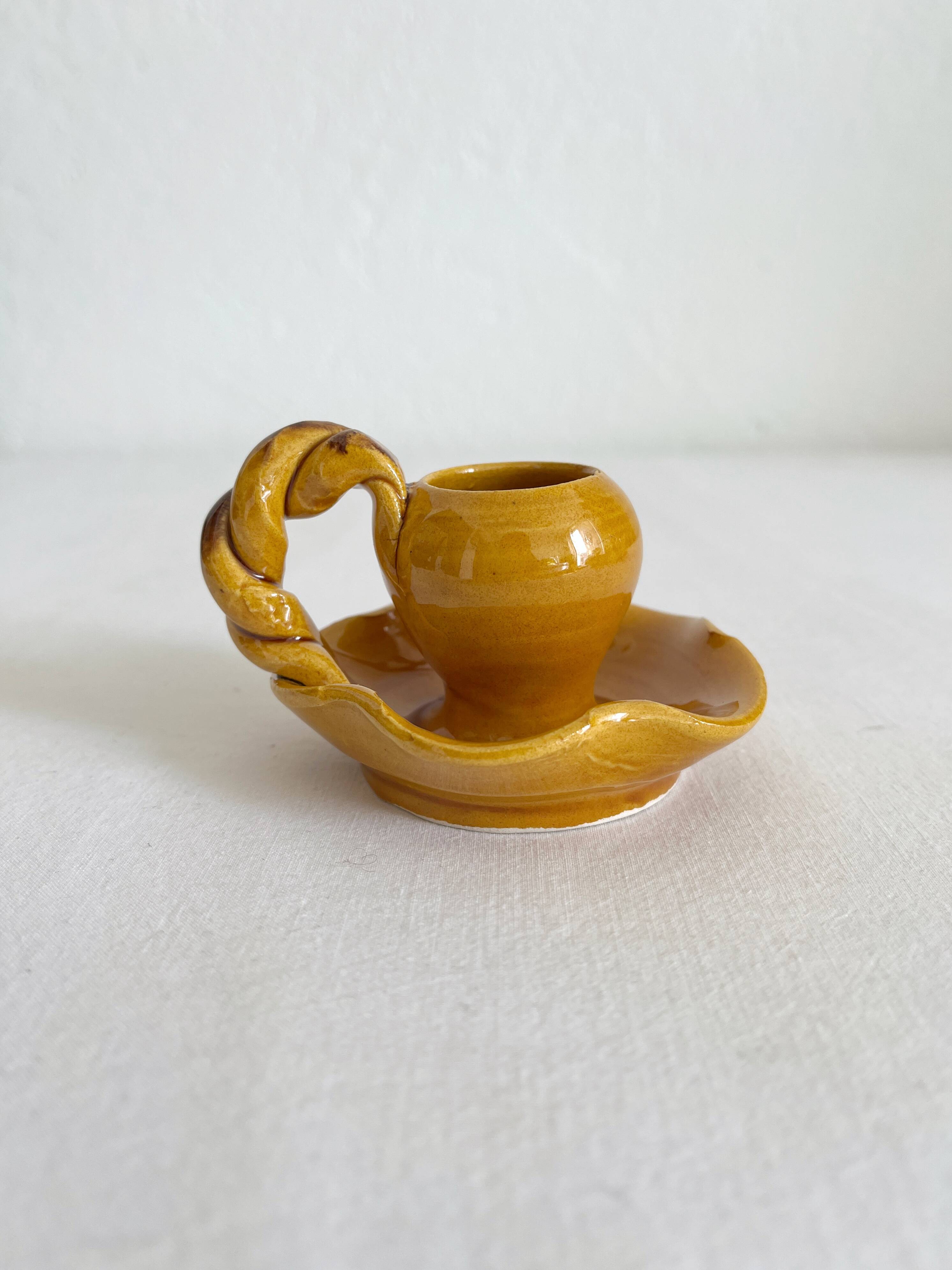 Mustard ceramic candle holder with vintage twisted handle